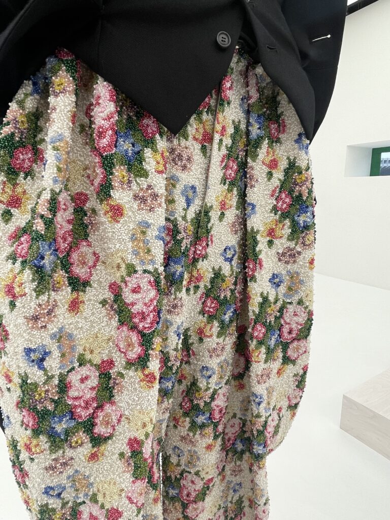 Hand beaded floral embroidery with vibrant colors - a reflection of Stylo Tokyo's color styling values.